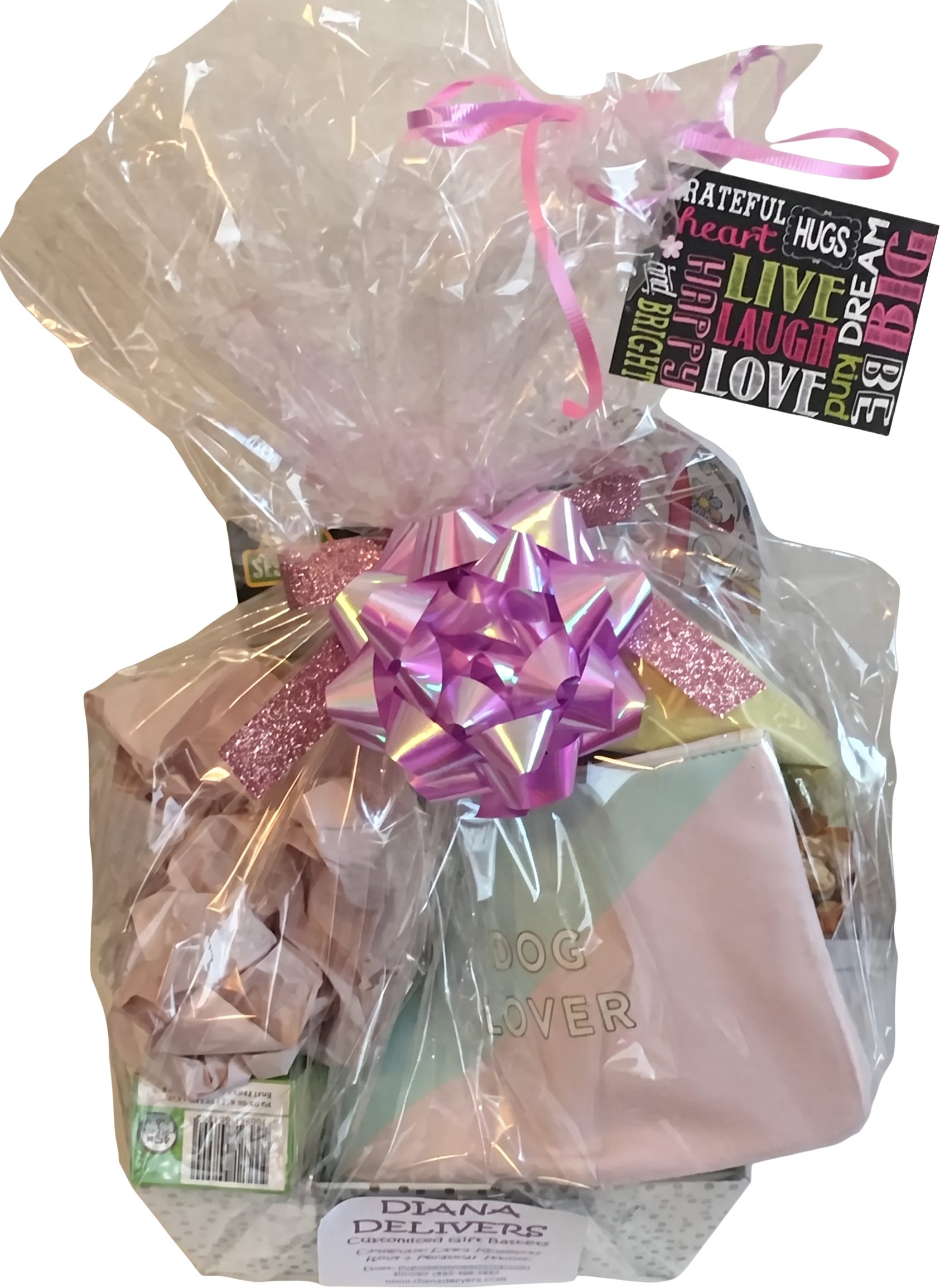 Pet lover gift basket with a dog lover pouch, treats, and a pink bow