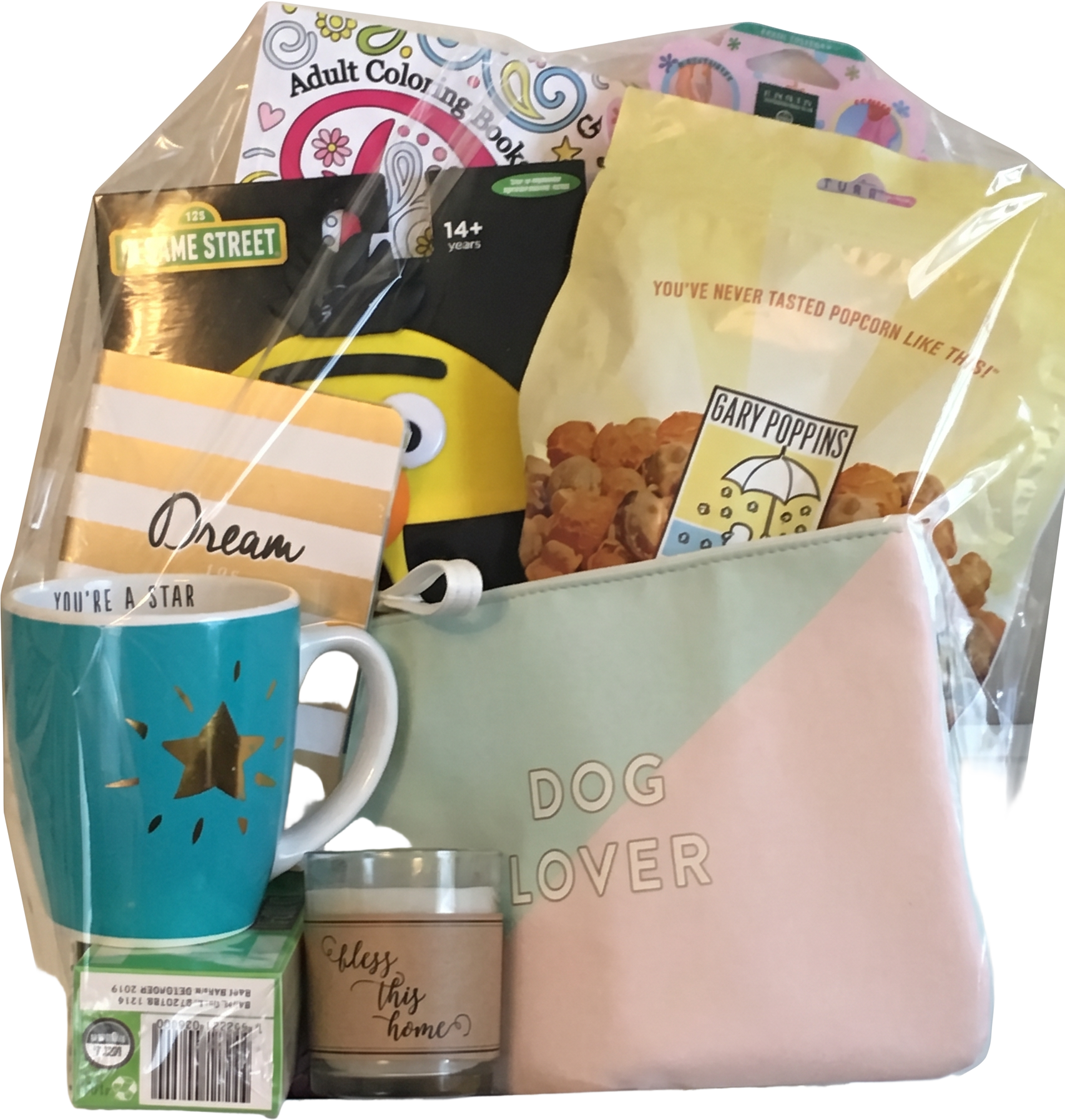 Gift basket with a dog lover pouch, popcorn, a you're a star mug, coloring book, and a candle